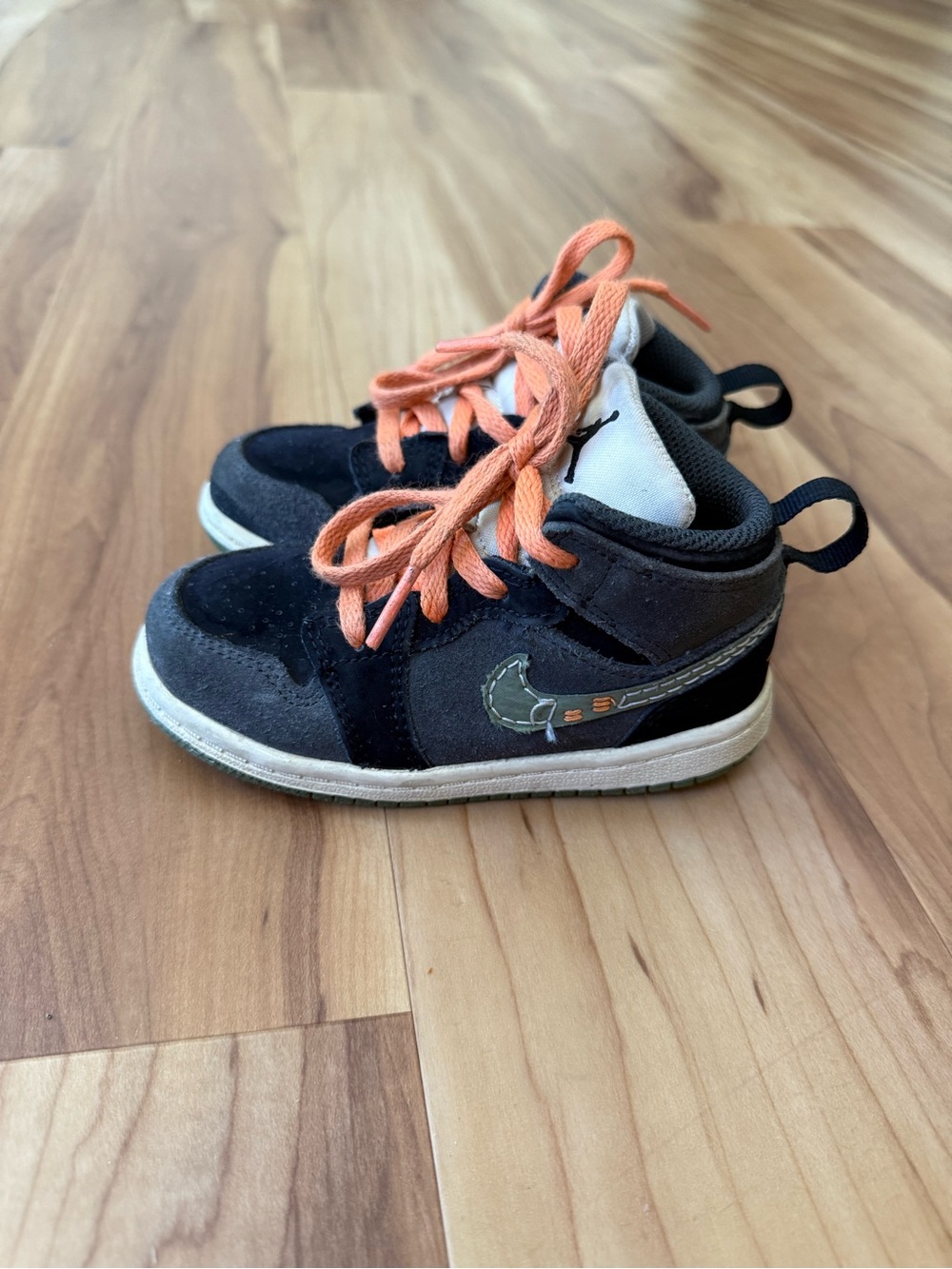 Nike Kids Black and Orange Jordan 1’s 8c